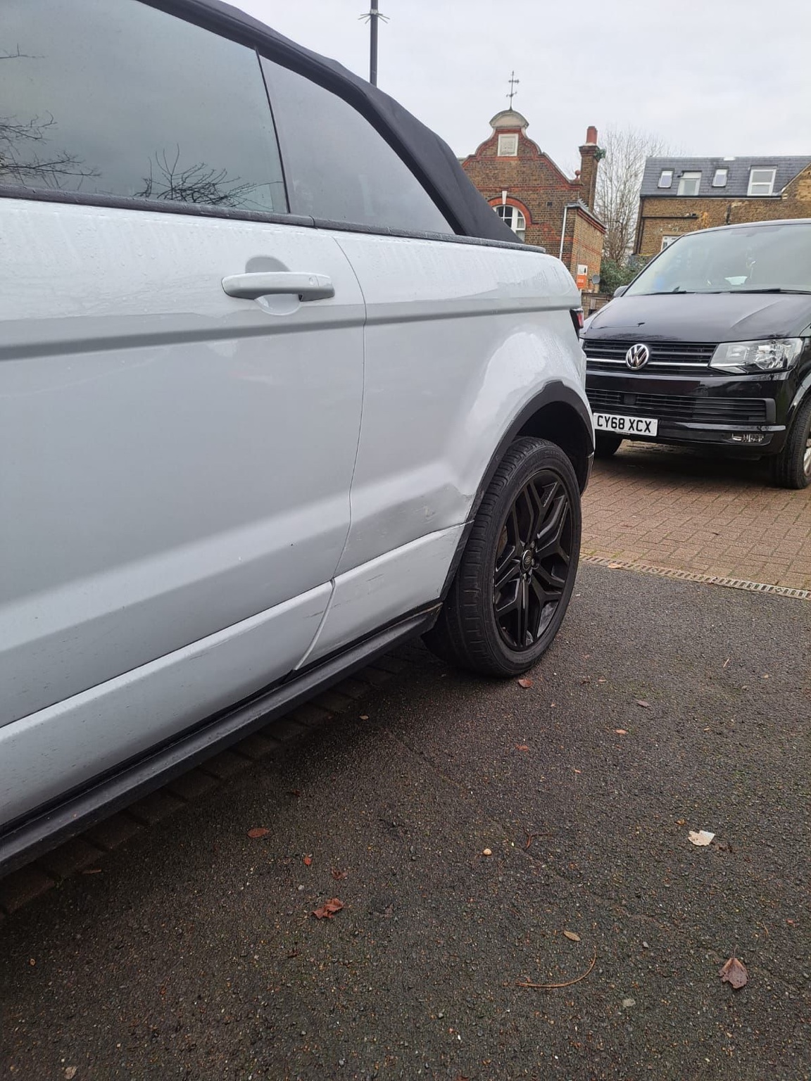 White Range Rover side panel repaired and refinished by BMAT LTD